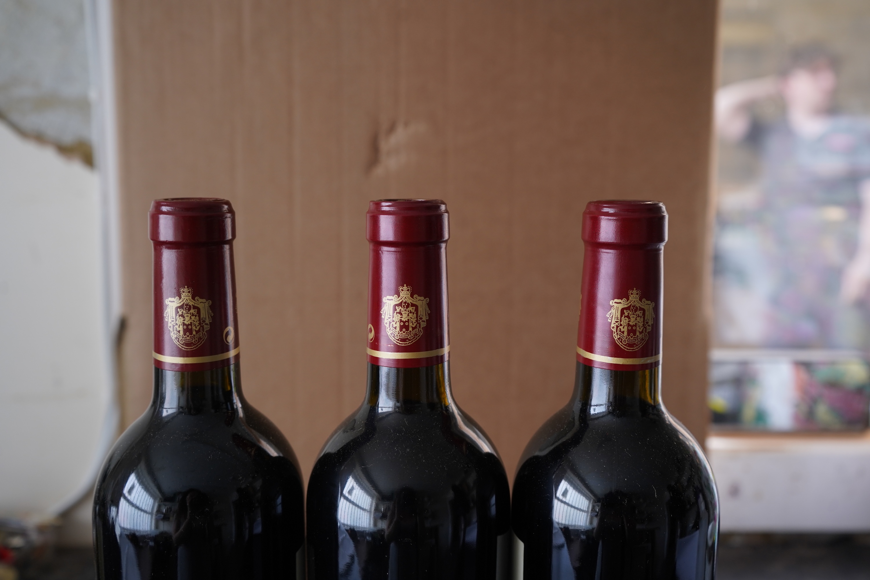 Nine bottles of 2002 Chateau d'Aiguilhe Castillon Cotes de Bordeaux, France